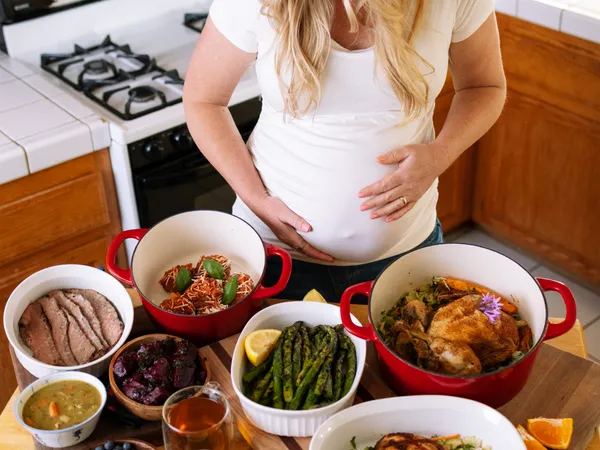 Clare Ramirez with home-cooked whole food postpartum meals